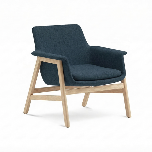 Blue armchair with wooden legs on a white background