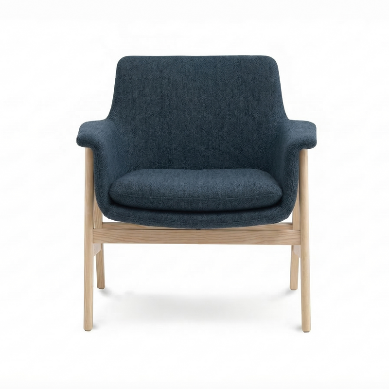 Load image into Gallery viewer, Blue armchair with wooden legs on a white background
