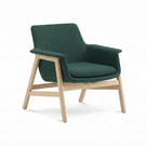 Blue armchair with wooden legs on a white background