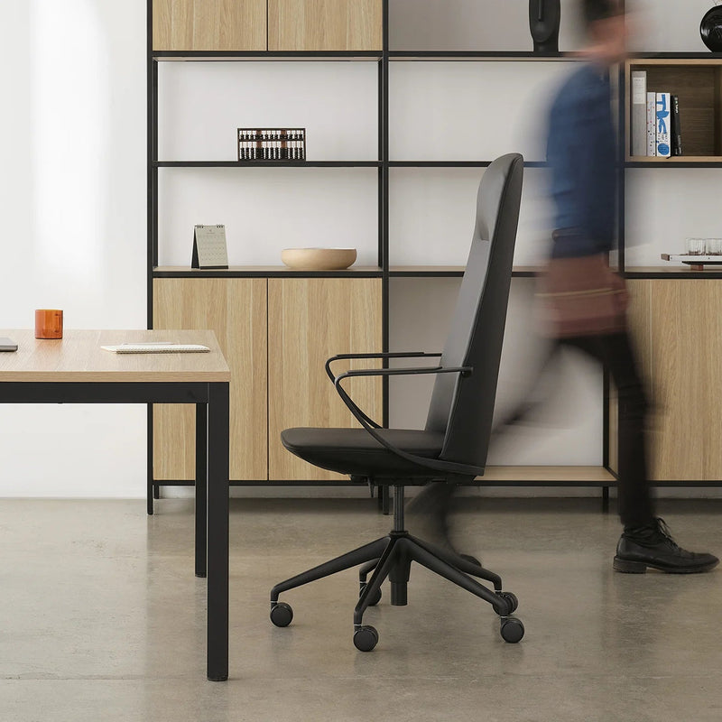 Load image into Gallery viewer, Modern office setup with a desk, chair, and bookshelf in a minimalistic office.
