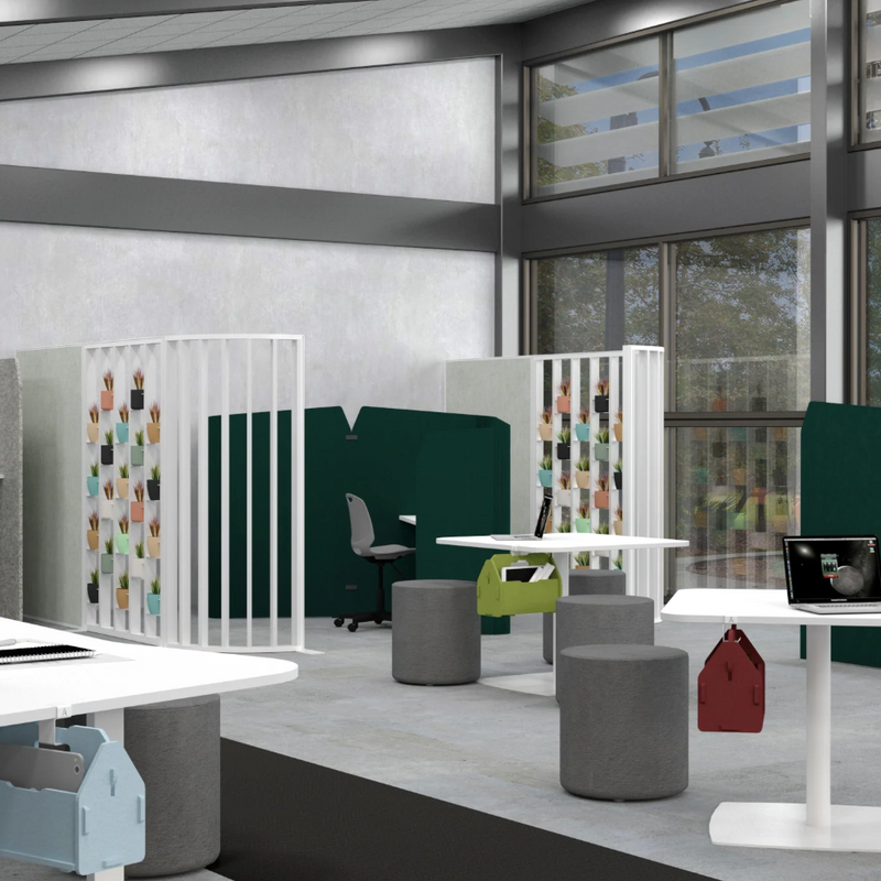 Load image into Gallery viewer, Modern office space with green partition walls and white desks.
