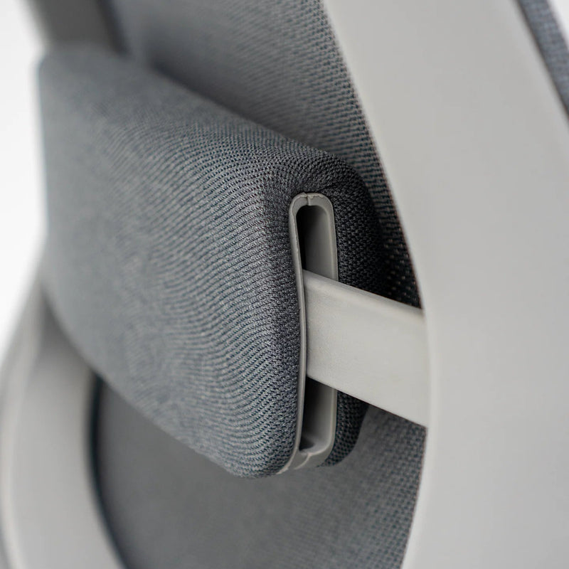 Load image into Gallery viewer, Close-up of a car seat belt buckle and strap on a gray car interior.
