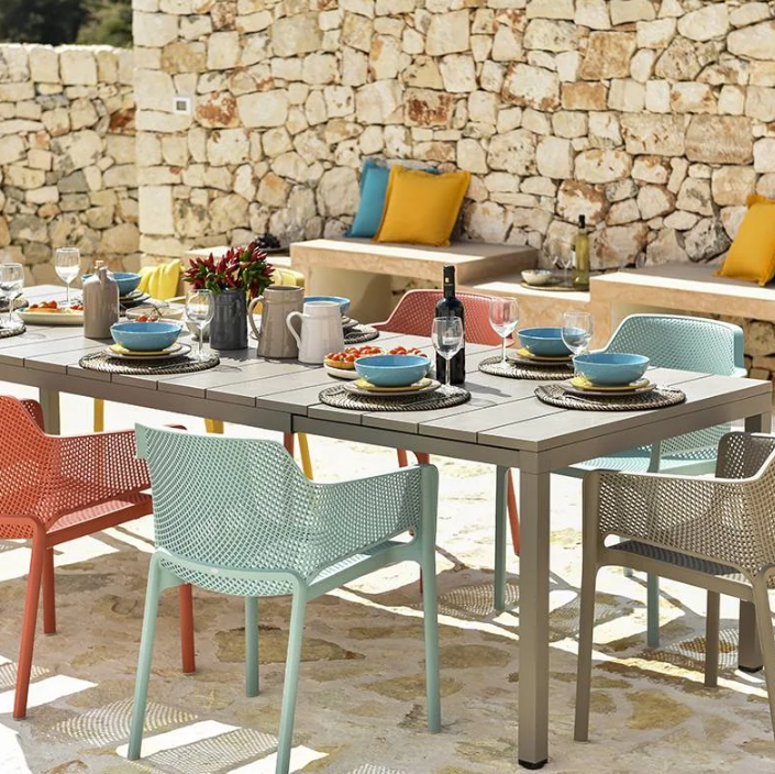 Load image into Gallery viewer, bright colored outdoor chairs and extendable table
